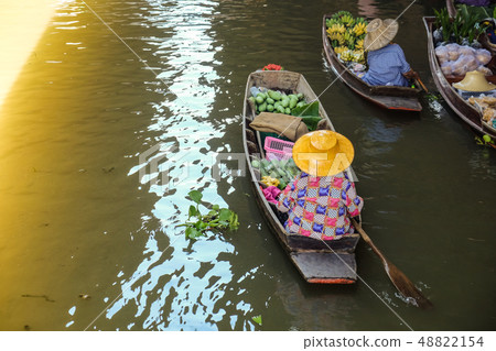 Traditional floating market of Damnoen Saduak with Traditional floating market of Damnoen Saduak with 48822154