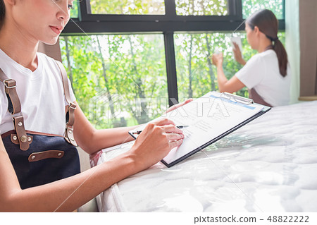 Professional cleaning service team working with Professional cleaning service team working with 48822222