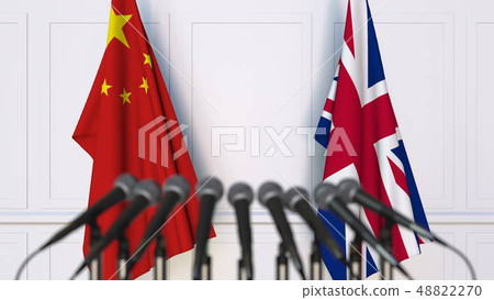Flags of China and The United Kingdom at international meeting or conference. 3D rendering Flags of China and The United Kingdom at international meeting or conference. 3D rendering 48822270