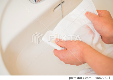 Laundry, shirt stain removal Laundry, shirt stain removal 48822891