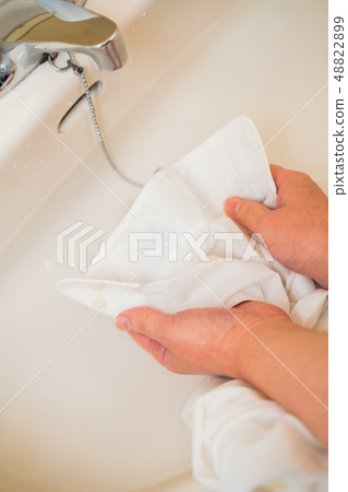 Laundry, shirt stain removal Laundry, shirt stain removal 48822899