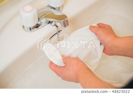 Laundry, shirt stain removal Laundry, shirt stain removal 48823022