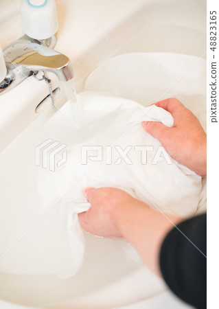 Washing shirts, stain removal Washing shirts, stain removal 48823165