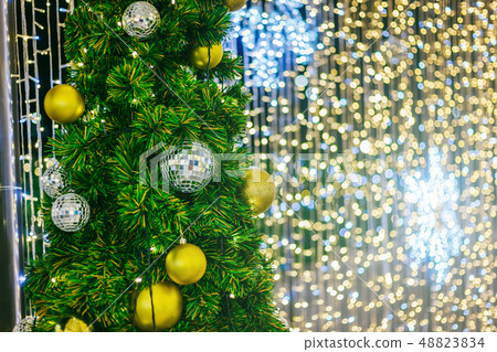 Closeup of Colorful balls on Green Christmas tree Closeup of Colorful balls on Green Christmas tree 48823834