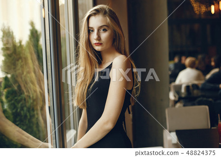 girl near window girl near window 48824375