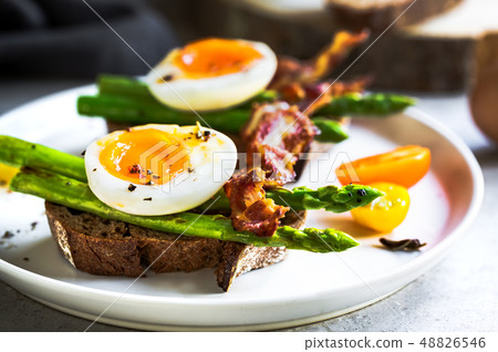 Bacon ,Seared Aspargus and Soft boiled egg  on Rye 48826546