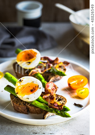 Bacon ,Seared Aspargus and Soft boiled egg on Rye Bacon ,Seared Aspargus and Soft boiled egg on Rye 48826549