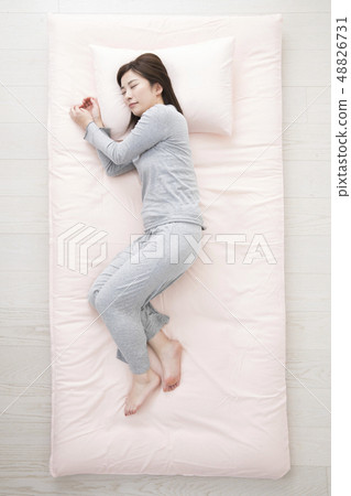 Sleeping woman, sideways 48826731