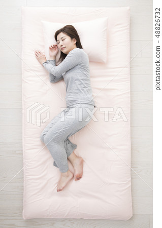 Sleeping woman, sideways 48826732