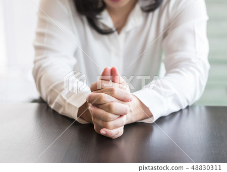 Woman praying in for religious holy spirit concept Woman praying in for religious holy spirit concept 48830311