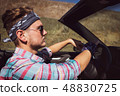 Stylish man in headband and colorful shirt 48830725