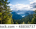 Scenic landscape overlooking the mountains 48830737