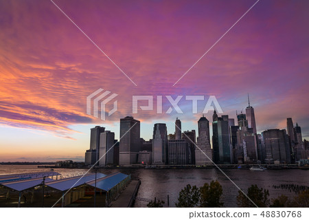 City downtown on background of amazing sunset City downtown on background of amazing sunset 48830768