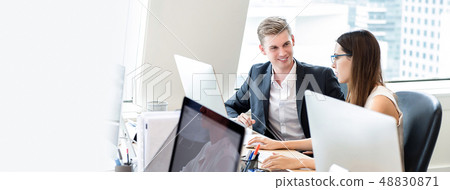 Happy business people coworkers working in office Happy business people coworkers working in office 48830871