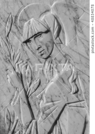 Bas-relief of a woman Bas-relief of a woman 48834078