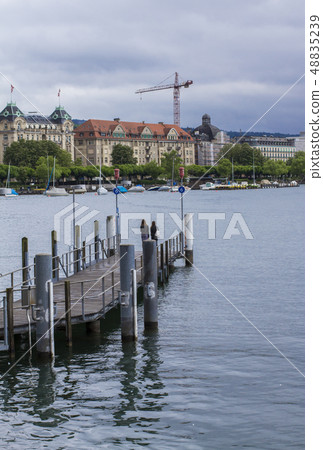 Pier in Zurich. Lake Zurich Pier in Zurich. Lake Zurich 48835239