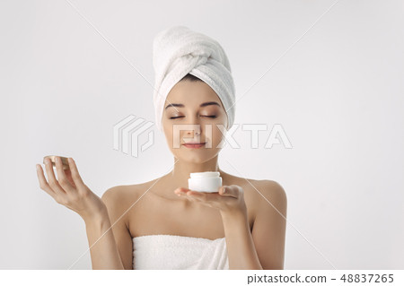 Skin Care. Woman With Natural Face Beauty Holding Facial Cream Skin Care. Woman With Natural Face Beauty Holding Facial Cream 48837265