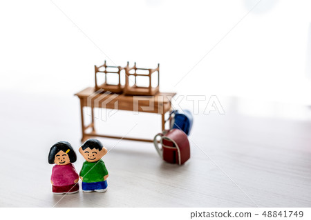 Male and female students standing in school classroom 48841749