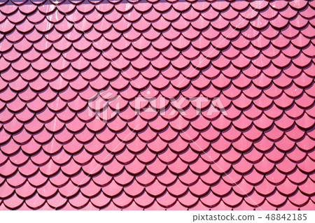 Roof tiles pink color design same fish scales 48842185
