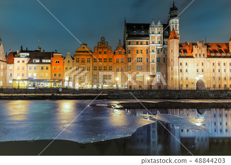 Mariacka Gate and other sights of Gdansk on the bank of the Motlawa, evening view 48844203