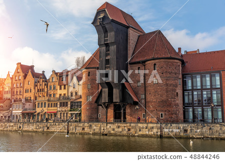 Zuraw, a famous Gdansk port crane by the Motlawa Zuraw, a famous Gdansk port crane by the Motlawa 48844246
