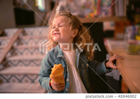 Emotional girl pressing lips while going to cry 48846002