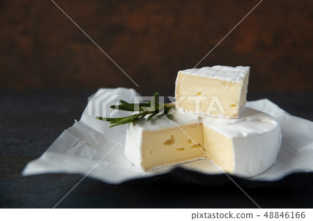 Cheese camembert or brie with fresh rosemary 48846166