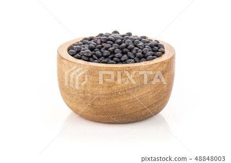 Black lentils beluga isolated on white 48848003