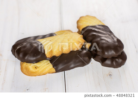 Lazy cookie with chocolate on grey wood 48848321
