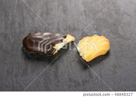 Lazy cookie with chocolate on grey stone 48848327