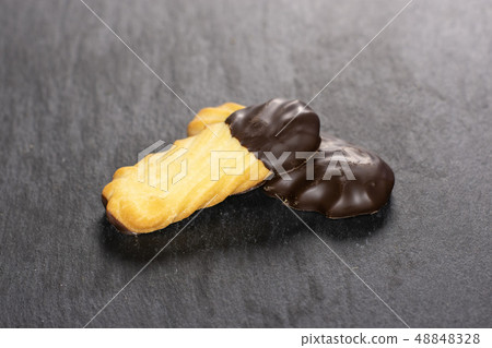 Lazy cookie with chocolate on grey stone 48848328