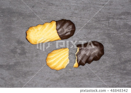 Lazy cookie with chocolate on grey stone 48848342