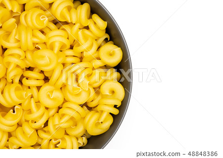 Raw pasta funghetto isolated on white Raw pasta funghetto isolated on white 48848386