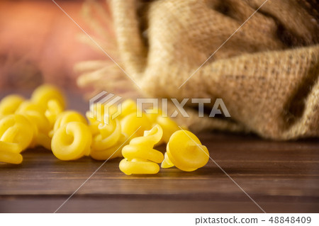 Raw pasta funghetto with cart 48848409