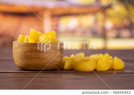 Raw pasta pipe rigate with cart Raw pasta pipe rigate with cart 48848483