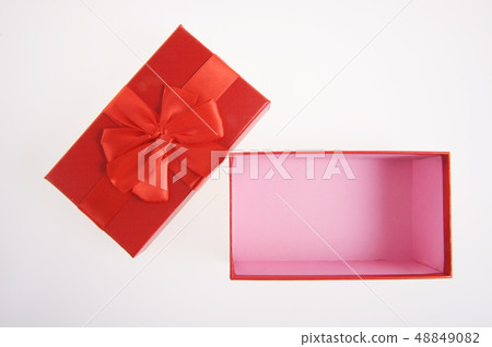 Red gift box with red ribbon and bow isolated on Red gift box with red ribbon and bow isolated on 48849082