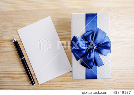 gift box on wooden background gift box on wooden background 48849127
