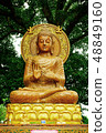 ancient buddha statue on big tree 48849160