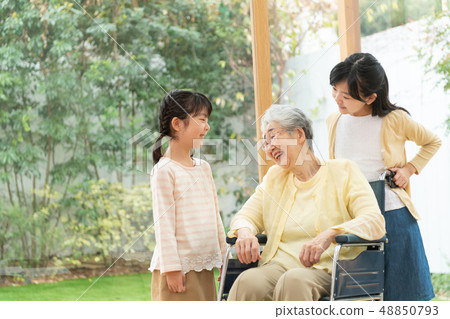 3 generations Family care care wheelchair Senior child family image 3 generations Family care care wheelchair Senior child family image 48850793
