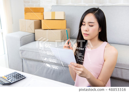 Young Asian woman entrepreneur or freelance online 48853316
