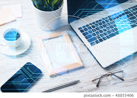 Business workplace with laptop coffee cup and security concept on screen Business workplace with laptop coffee cup and security concept on screen 48855406