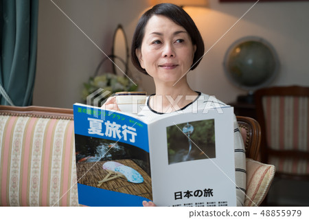 Travel, women, travel magazines (fictional magazines) 48855979