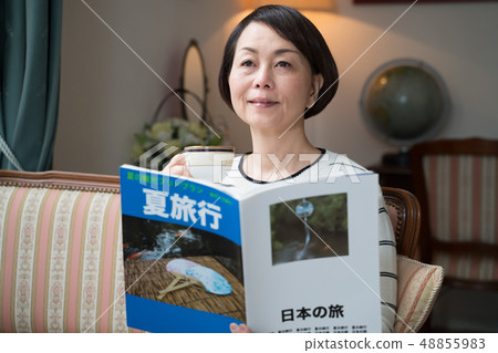 Travel, women, travel magazines (fictional magazines) 48855983