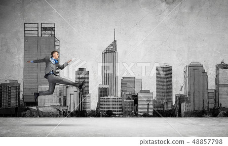 Businessman jumping high 48857798