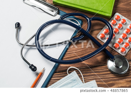 Desk of doctor with medicine things Desk of doctor with medicine things 48857865