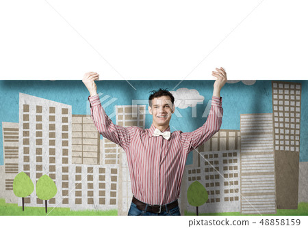 Cheerful man with banner Cheerful man with banner 48858159