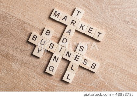 Conceptual business keywords on table with elements of game making crossword Conceptual business keywords on table with elements of game making crossword 48858753