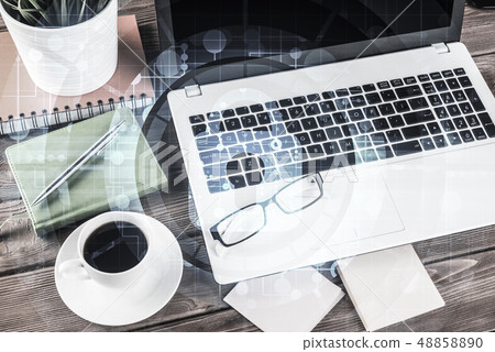 Business workplace with laptop coffee cup and security concept o Business workplace with laptop coffee cup and security concept o 48858890