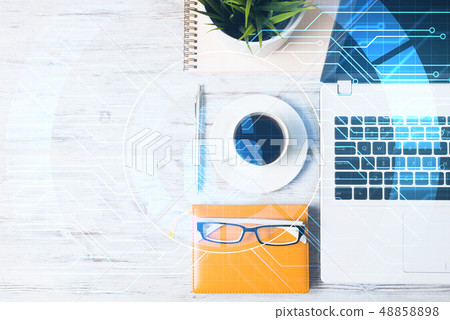 Business workplace with laptop coffee cup and security concept on screen Business workplace with laptop coffee cup and security concept on screen 48858898
