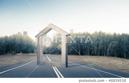 Conceptual background image of concrete home sign on asphalt roa 48859538